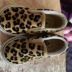 Slightly worn vans slip on skate shoe leopard
